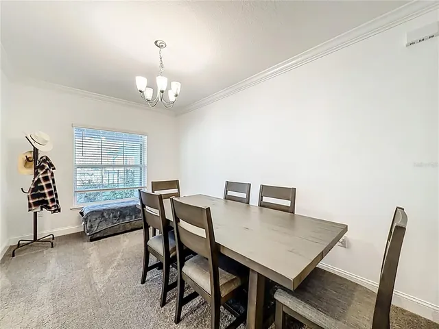 a kitchen with granite countertop a stove and a microwave