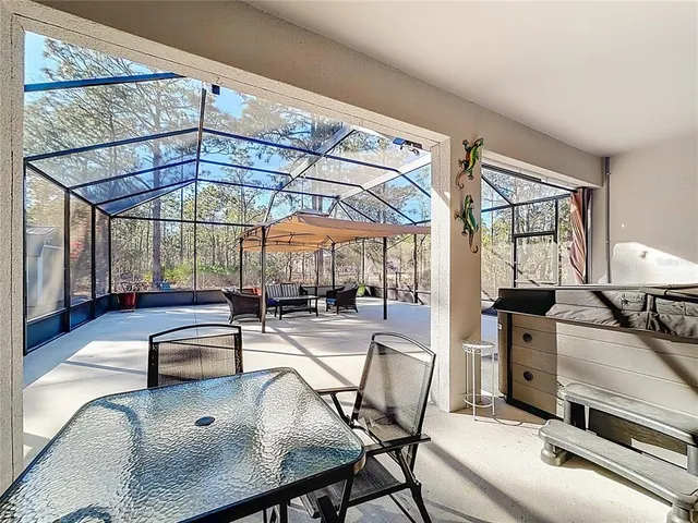 an aerial view of residential house with outdoor space