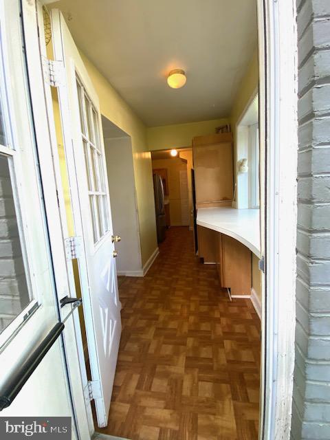 5707 Harwick Road Bethesda, MD 20816 - Photo 7 of 32 Side entrance to elongated galley kitchen.