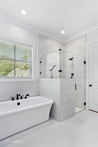 a bathroom with bathtub