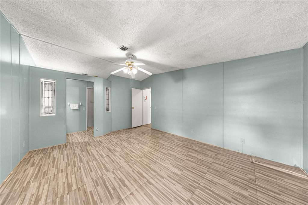 6366 Southwest 84th Lane Ocala, FL 34476 - Photo 14 of 40 a view of a livingroom with a chandelier