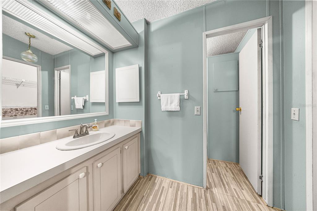 6366 Southwest 84th Lane Ocala, FL 34476 - Photo 15 of 40 a bathroom with a double vanity sink and mirror