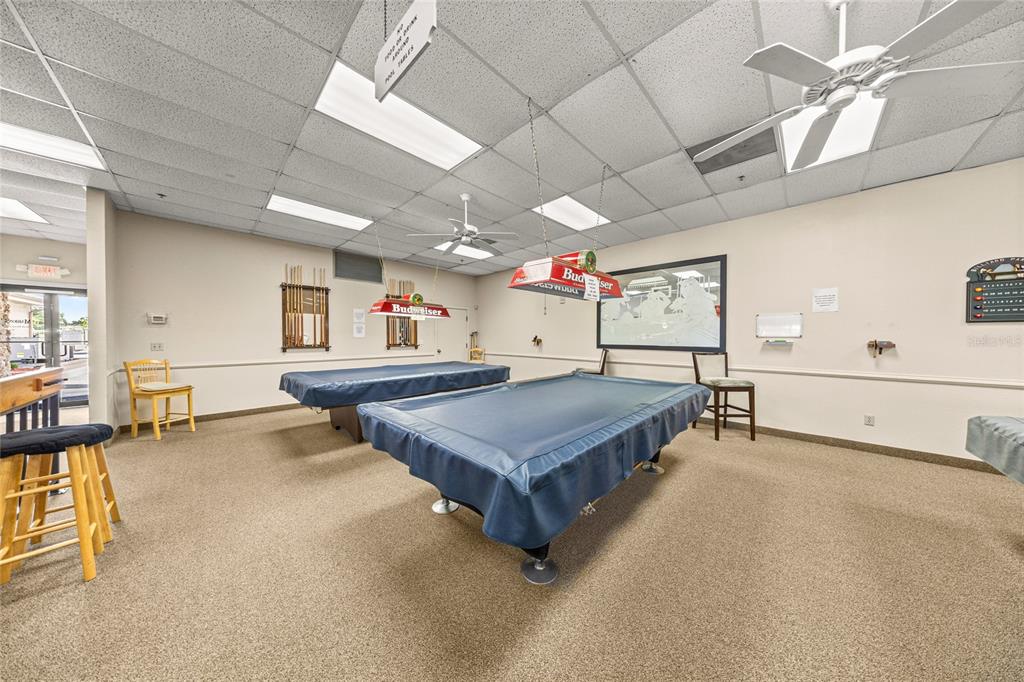 6366 Southwest 84th Lane Ocala, FL 34476 - Photo 39 of 40 a room with pool table and windows