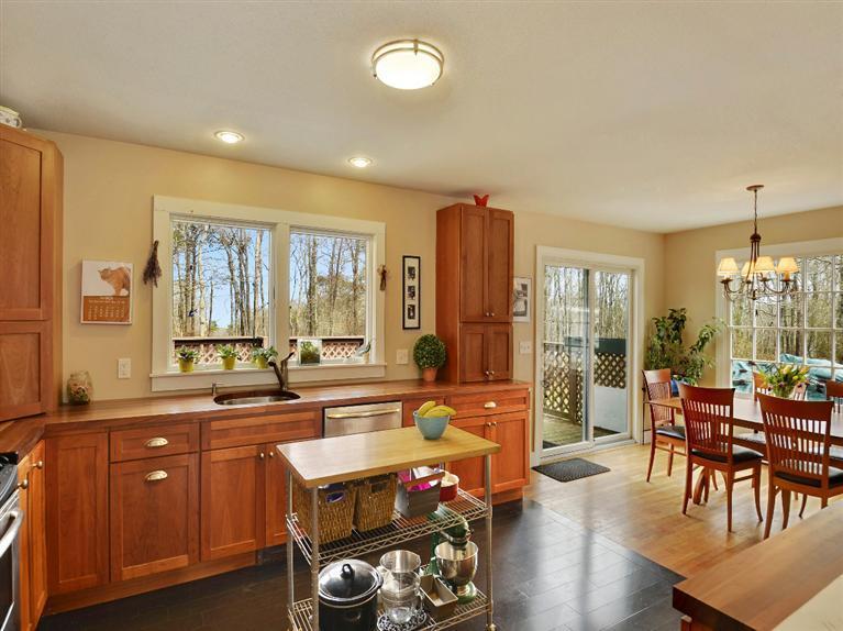 11 Crowell Road Sandwich, MA 02563 - Photo 3 of 19 a large kitchen with sink refrigerator and dining table