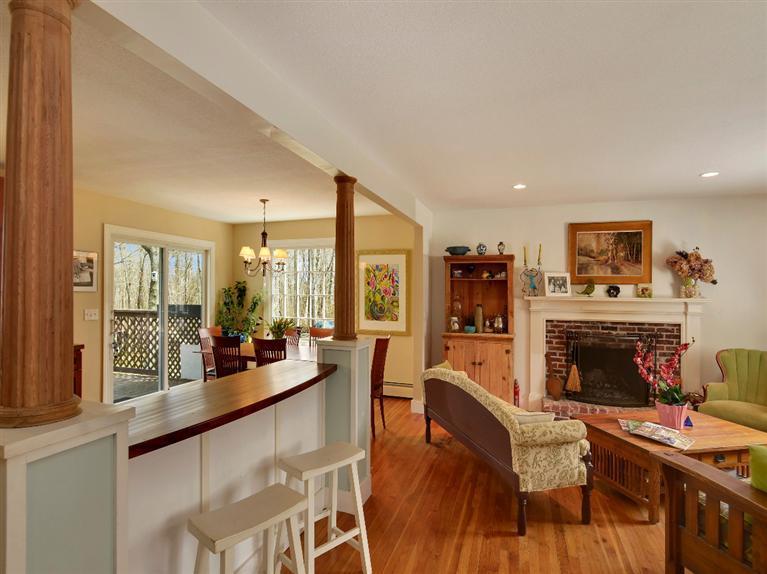 11 Crowell Road Sandwich, MA 02563 - Photo 4 of 19 a large living room with furniture and a fireplace
