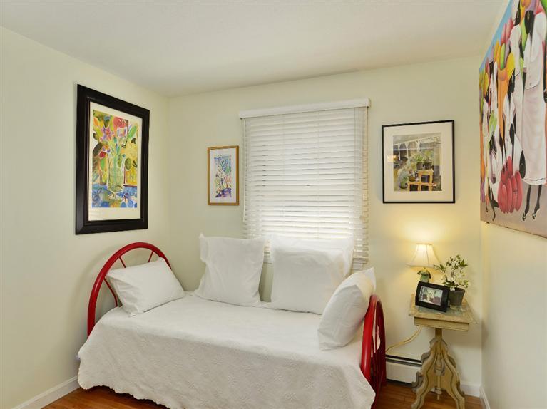 11 Crowell Road Sandwich, MA 02563 - Photo 8 of 19 a bedroom with a bed and a couch