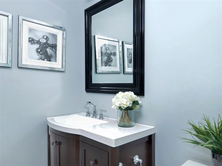 11 Crowell Road Sandwich, MA 02563 - Photo 10 of 19 a bathroom with a sink mirror and vanity