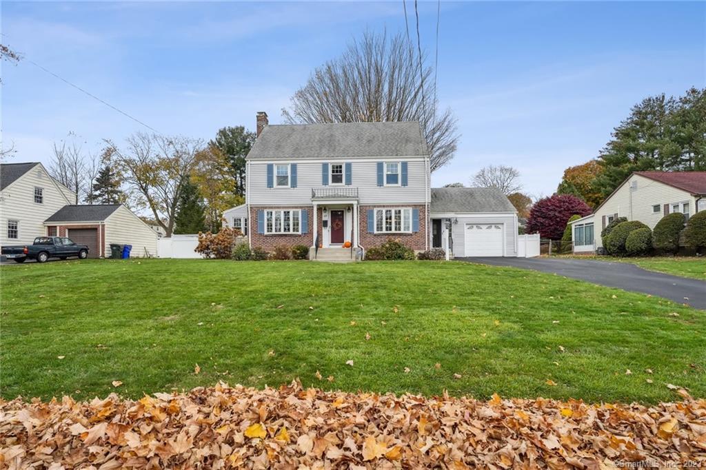 37 Ruscan Road Wethersfield, CT 06109 - Photo 1 of 1 a front view of a house with a yard