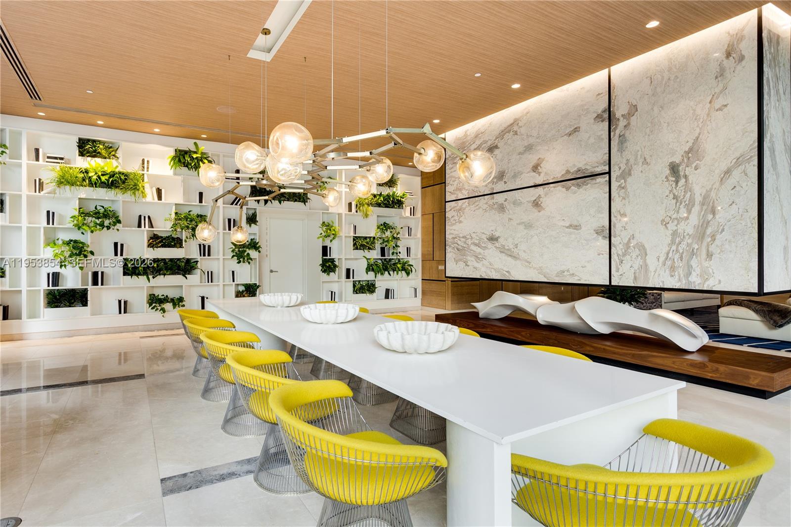 55 Southwest 9th Street, Unit 2406 Miami, FL 33130 - Photo 34 of 38 a bathroom with a granite countertop tub and a large mirror