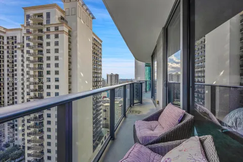 a balcony with furniture