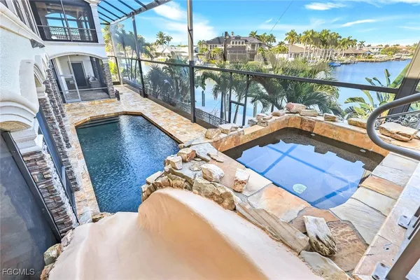 a view of a building with a swimming pool