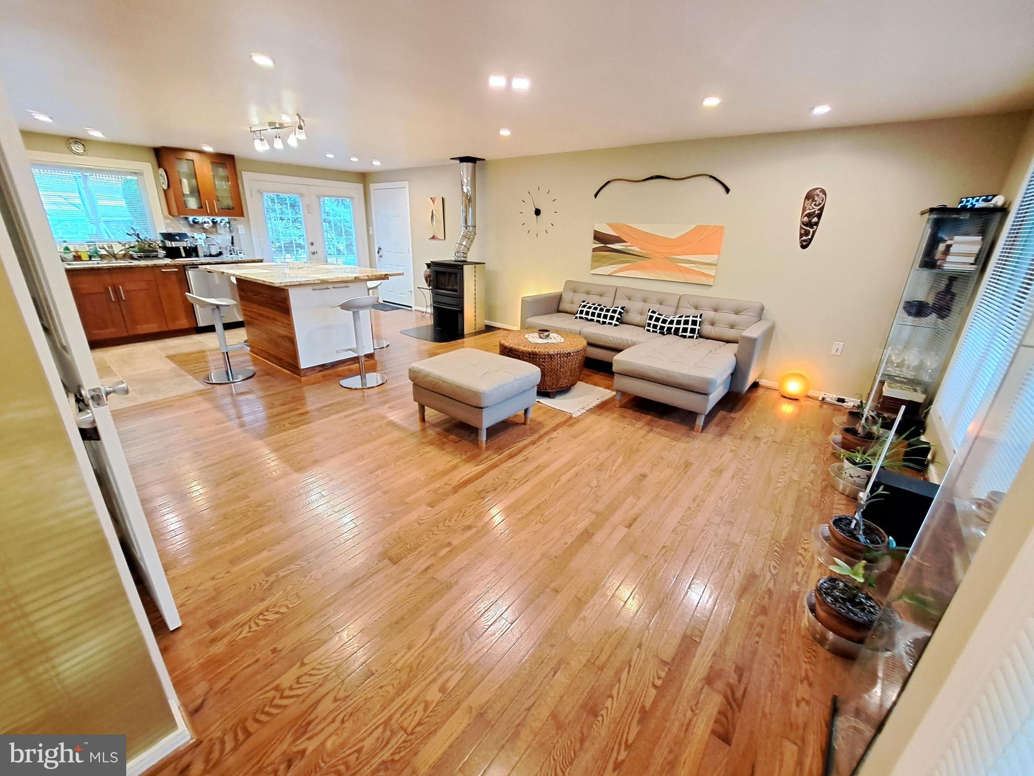 10929 Howland Drive Reston, VA 20191 - Photo 12 of 66 a living room with furniture and a flat screen tv