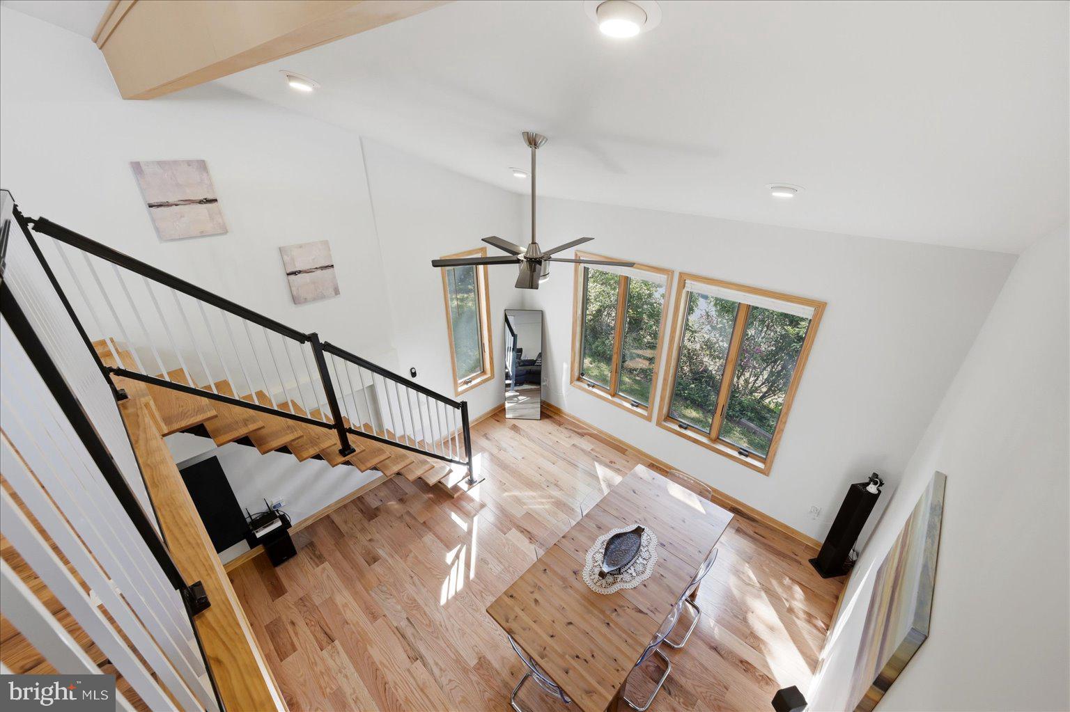 10929 Howland Drive Reston, VA 20191 - Photo 17 of 66 a front view of a house with wooden floor and windows