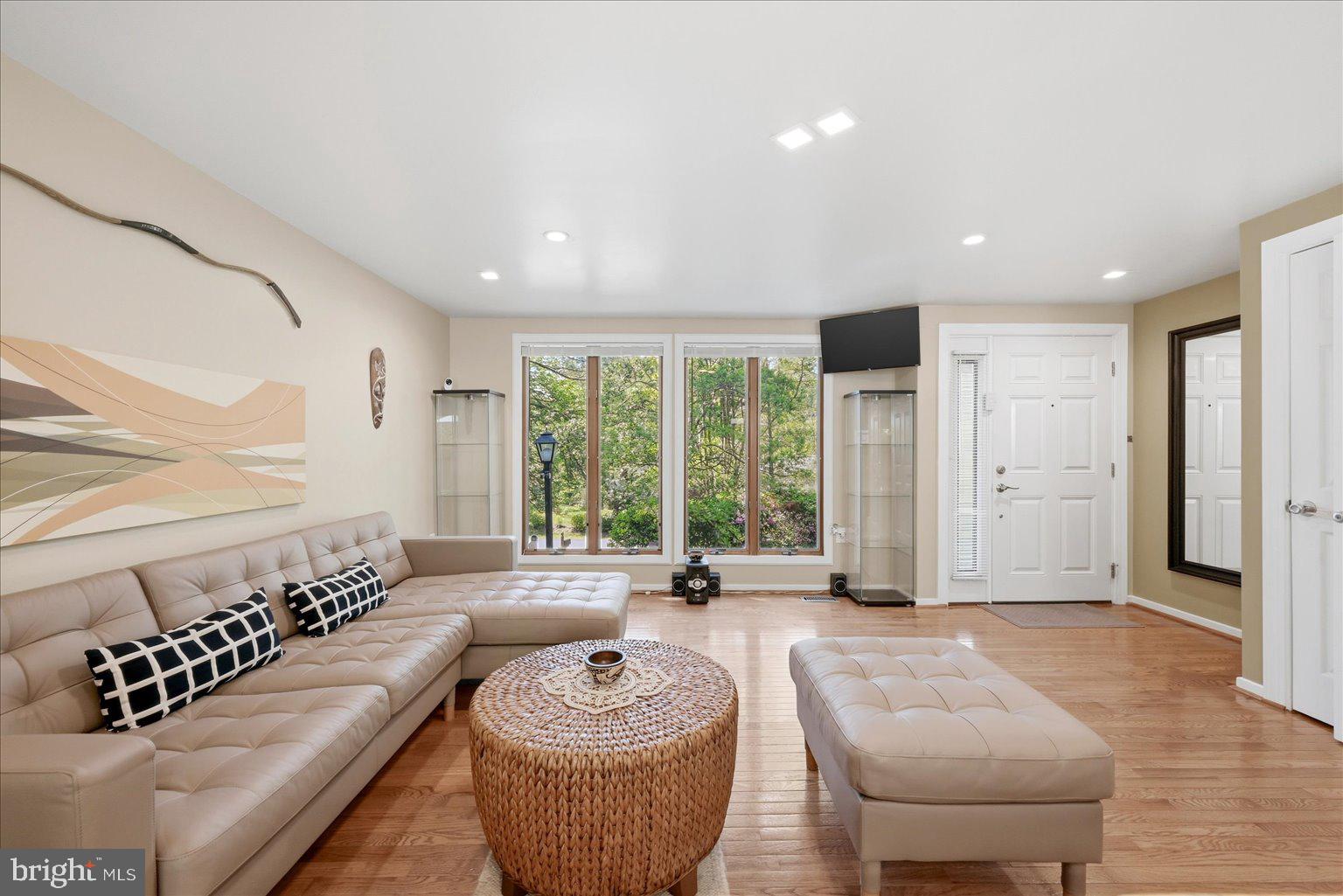 10929 Howland Drive Reston, VA 20191 - Photo 2 of 66 a living room with furniture and a large window