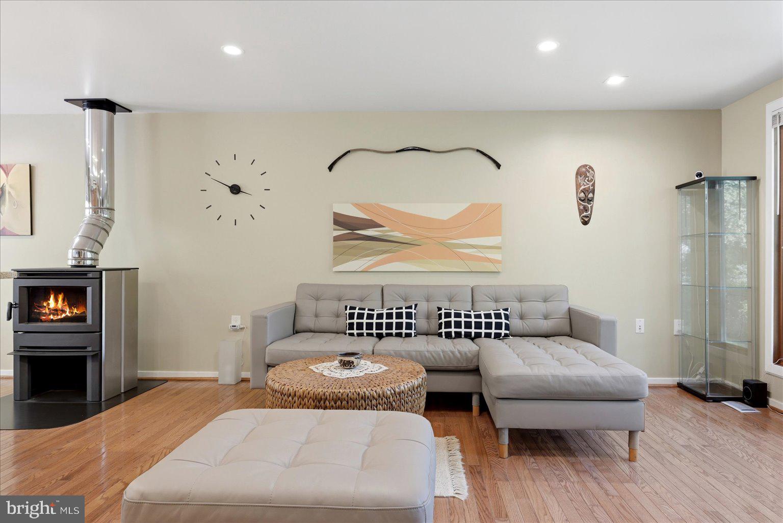 10929 Howland Drive Reston, VA 20191 - Photo 3 of 66 a bedroom with a bed and a couch