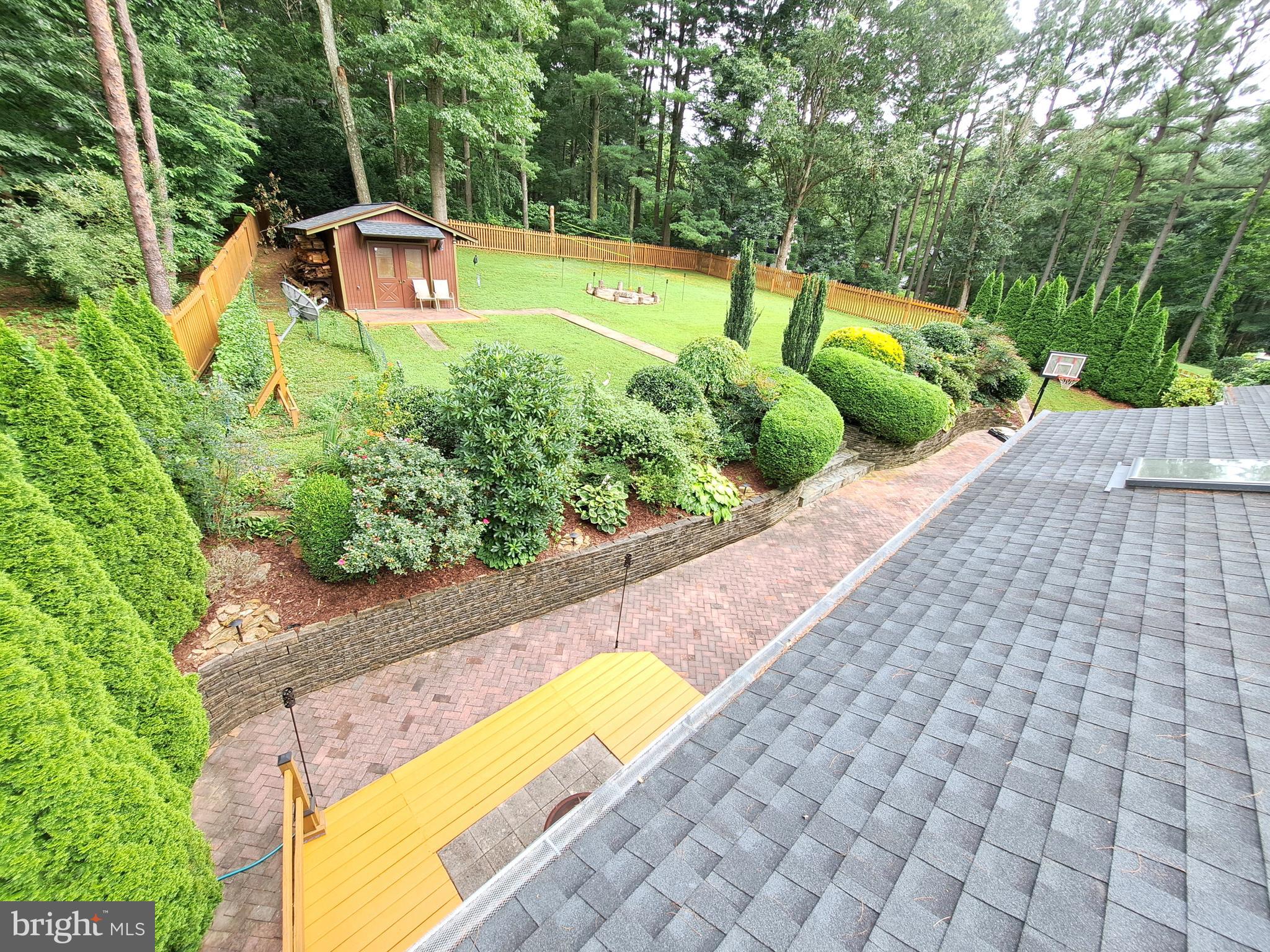 10929 Howland Drive Reston, VA 20191 - Photo 46 of 66 a view of a backyard with plants