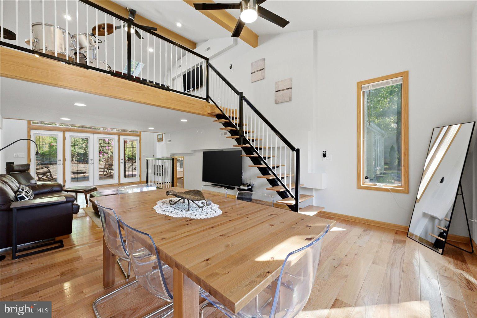 10929 Howland Drive Reston, VA 20191 - Photo 5 of 66 a view of a dining room with furniture window and wooden floor
