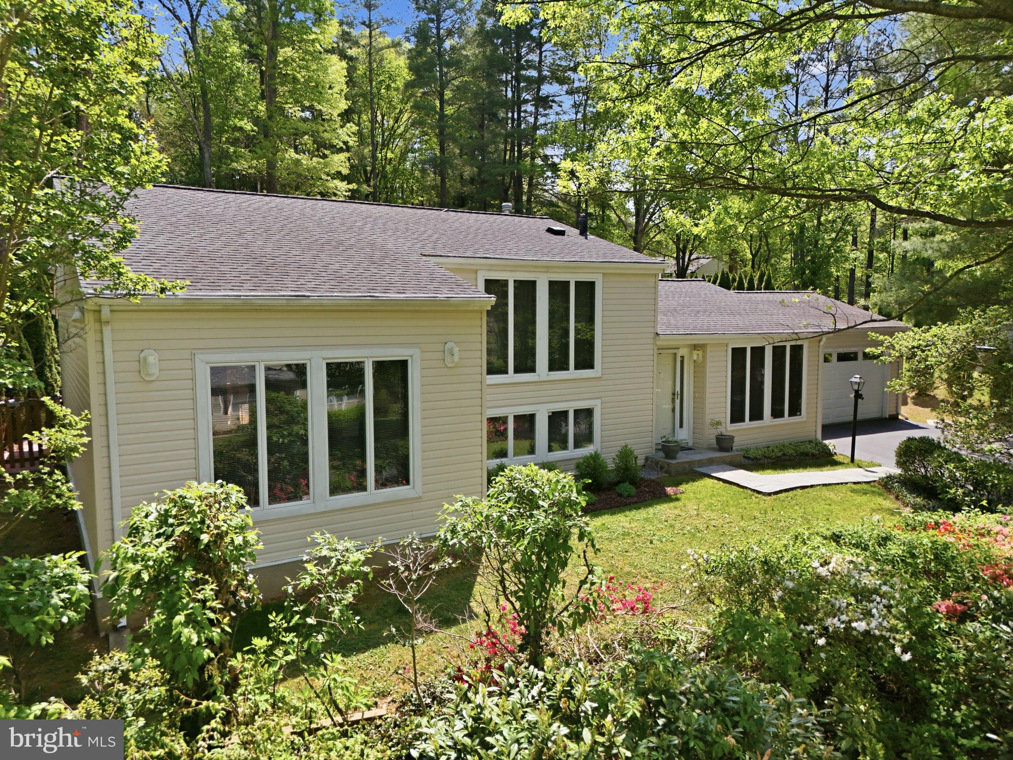 10929 Howland Drive Reston, VA 20191 - Photo 61 of 66 front view of a house with a yard
