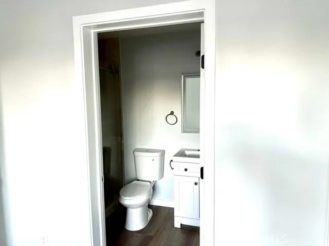 a bathroom with a toilet and a sink