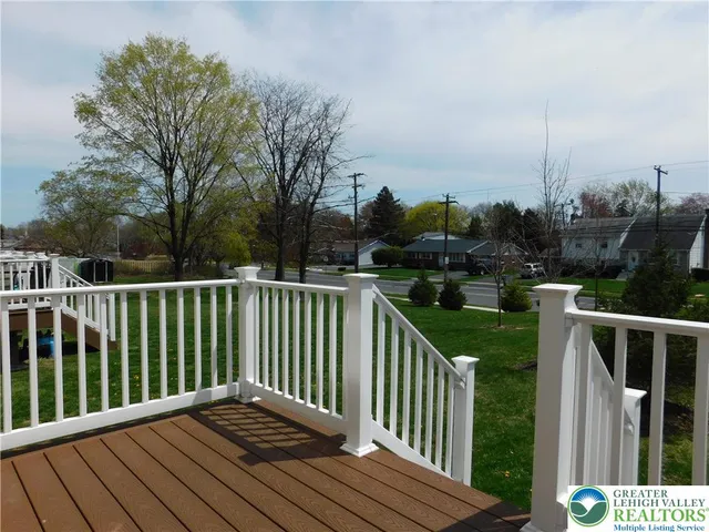 a view of a wooden roof deck