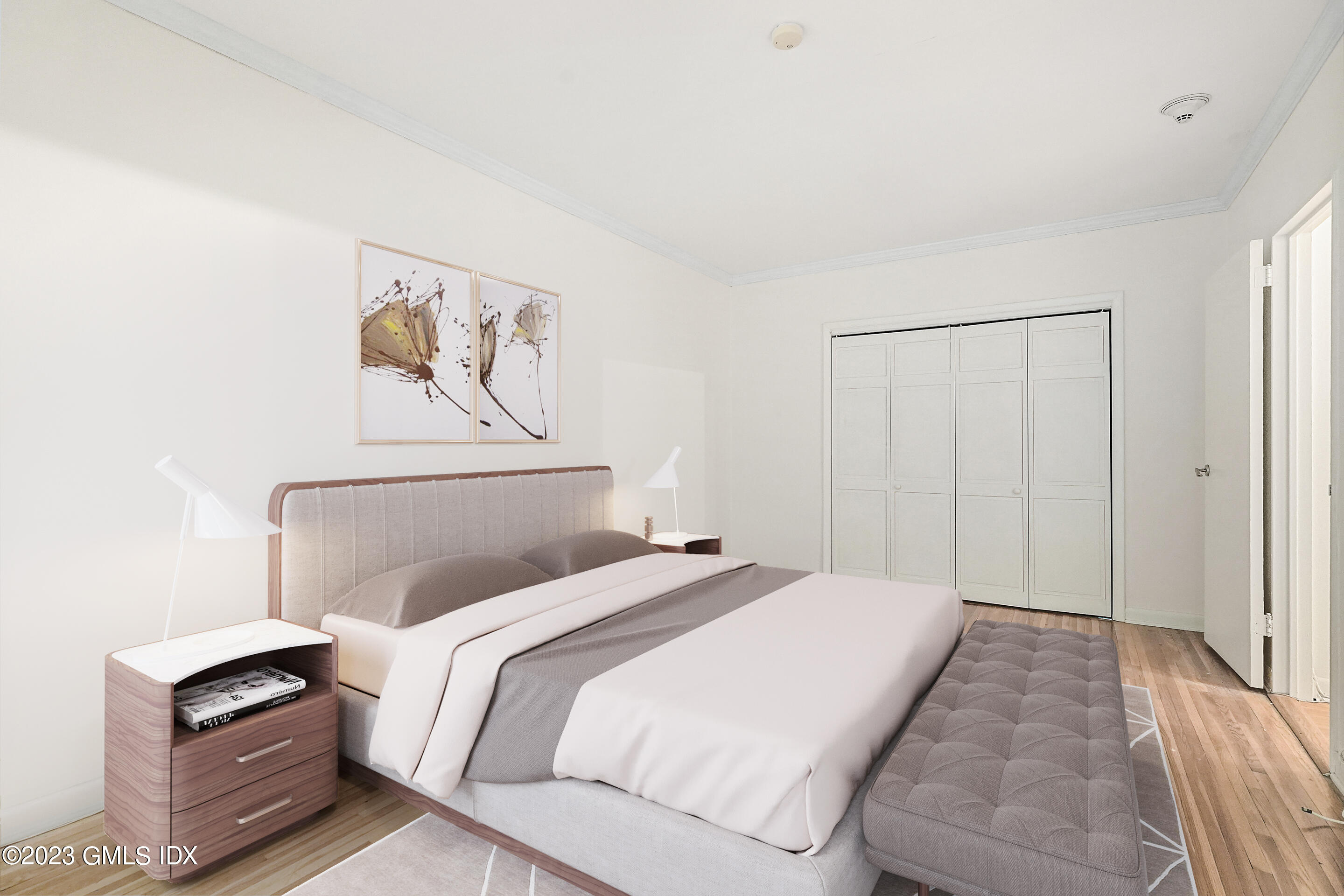 20 Church Street, Unit B35 Greenwich, CT 06830 - Photo 9 of 16 a bedroom with a bed and a tv