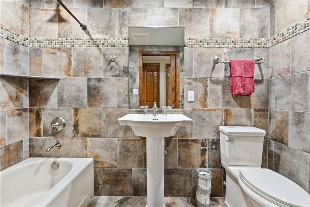 265 McFann Road Valencia, PA 16059 - Photo 34 of 50 a bathroom with a sink toilet and shower