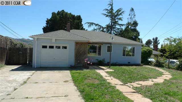 816 Marin Road El Sobrante, CA 94803 - Photo 1 of 1 a front view of a house with a yard