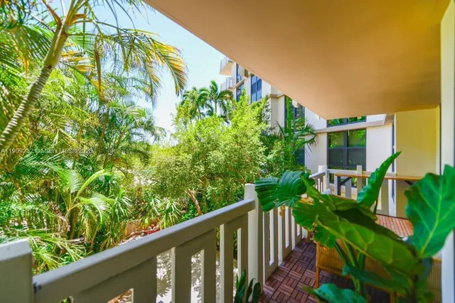 a view of a garden from a balcony