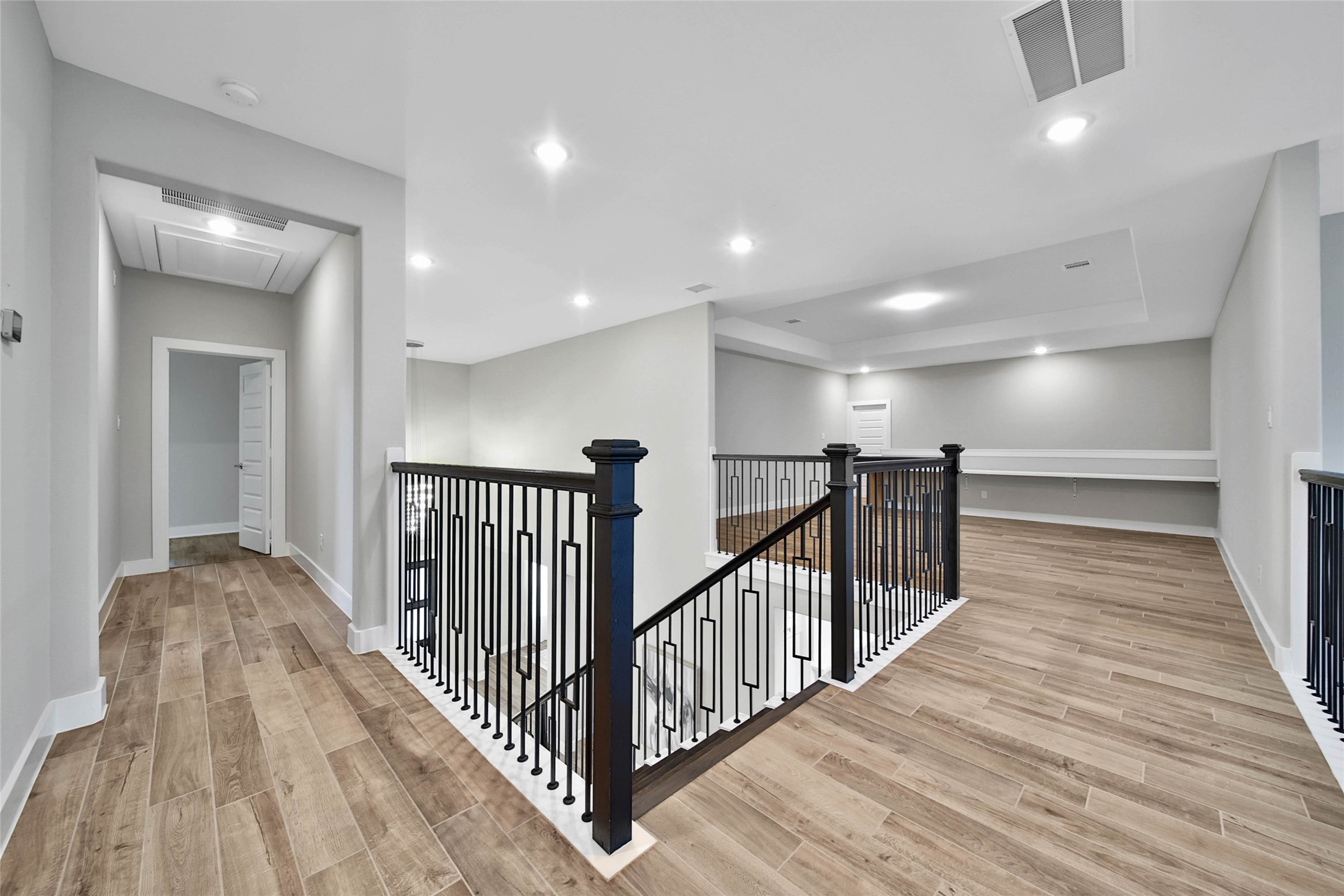 29402 Cir S Rnch Trail Fulshear, TX 77406 - Photo 33 of 50 Either the main staircase from the foyer or a back staircase off the kitchen provides two convenient options to access the upstairs. This thoughtful layout adds both functionality and ease of flow throughout the home.
