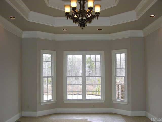 9020 Chelsea Drive Raleigh, NC 27603 - Photo 7 of 10 a view of a chandelier in a room