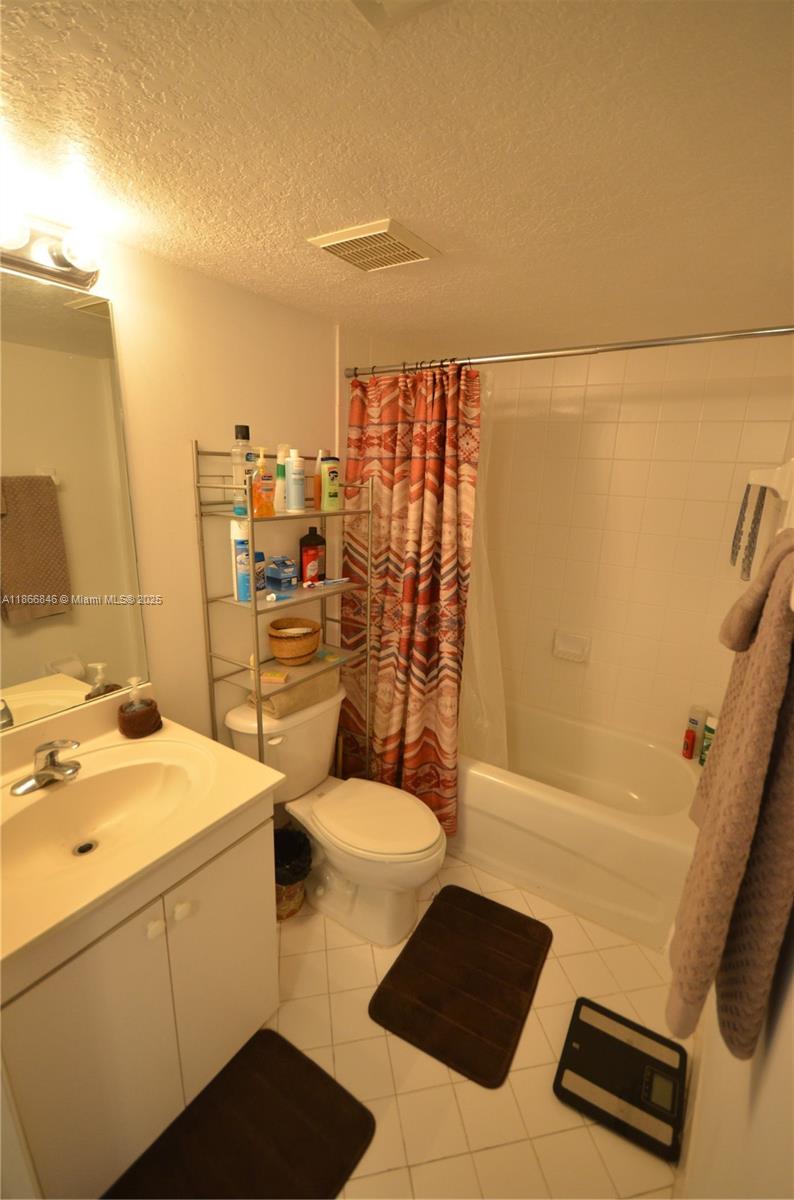 1270 Southeast 27th Street, Unit 101 Homestead, FL 33035 - Photo 15 of 32 a bathroom with a sink toilet and shower
