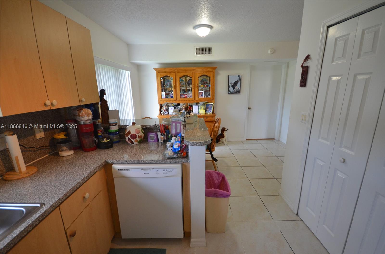 1270 Southeast 27th Street, Unit 101 Homestead, FL 33035 - Photo 28 of 32 a room with storage and utility