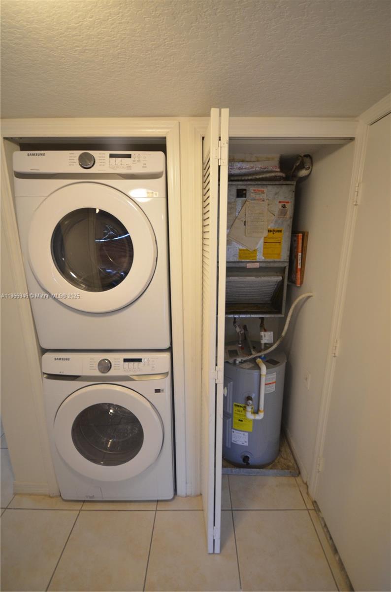1270 Southeast 27th Street, Unit 101 Homestead, FL 33035 - Photo 8 of 32 a utility room with dryer and washer