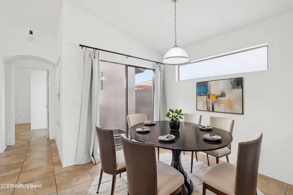 a very nice looking hallway with a chandelier