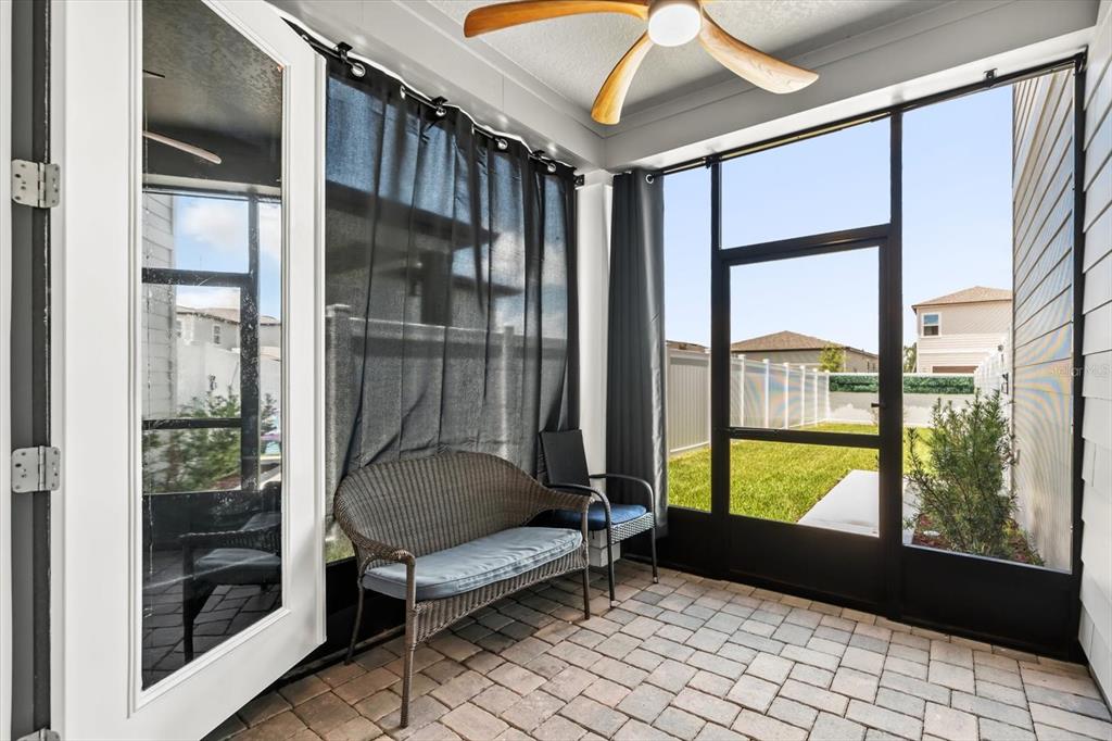 17061 Seville Orange Road Winter Garden, FL 34787 - Photo 16 of 42 a living room with a large window and table