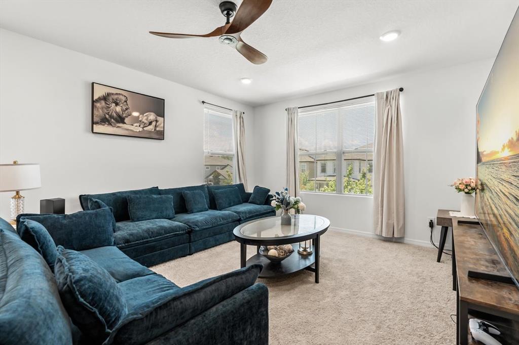 17061 Seville Orange Road Winter Garden, FL 34787 - Photo 20 of 42 a living room with furniture and a window