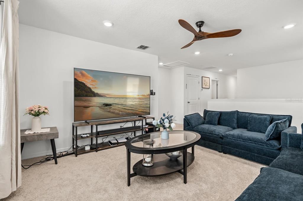 17061 Seville Orange Road Winter Garden, FL 34787 - Photo 21 of 42 a living room with furniture