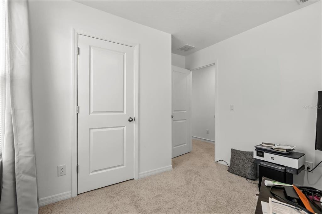 17061 Seville Orange Road Winter Garden, FL 34787 - Photo 32 of 42 a view of room with workspace