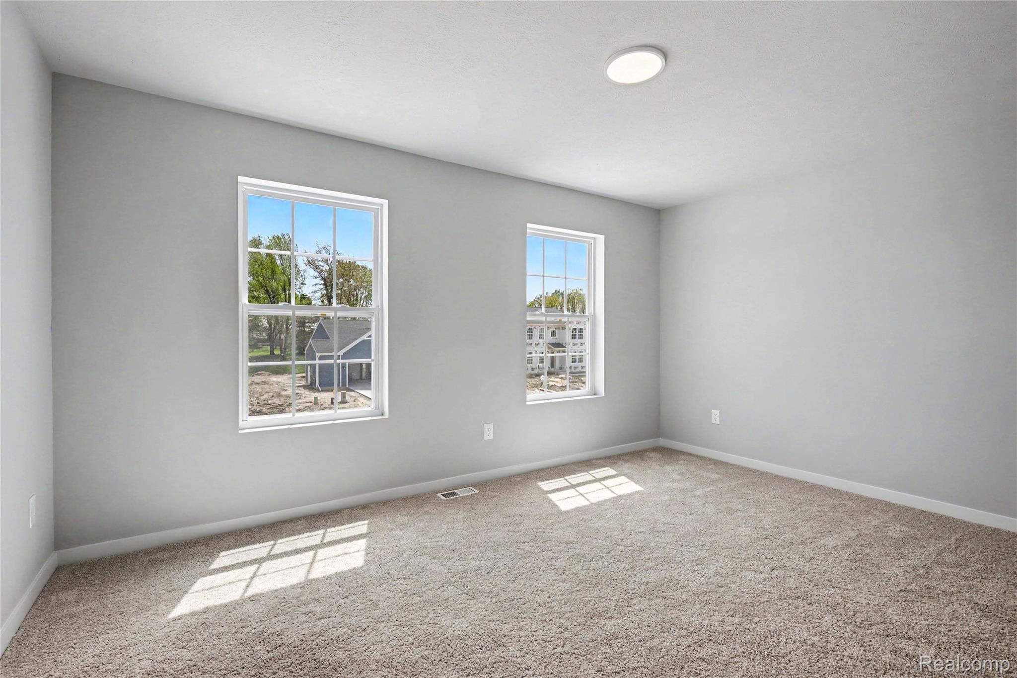1230 Lockes Street Howell, MI 48843 - Photo 10 of 27 Stock Photo-Primary Bedroom