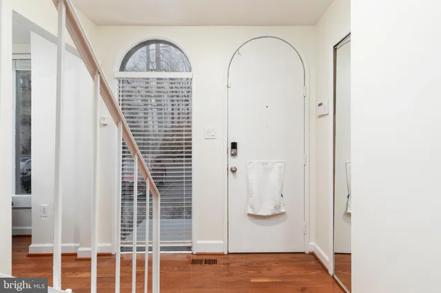 a view of entryway with bathroom