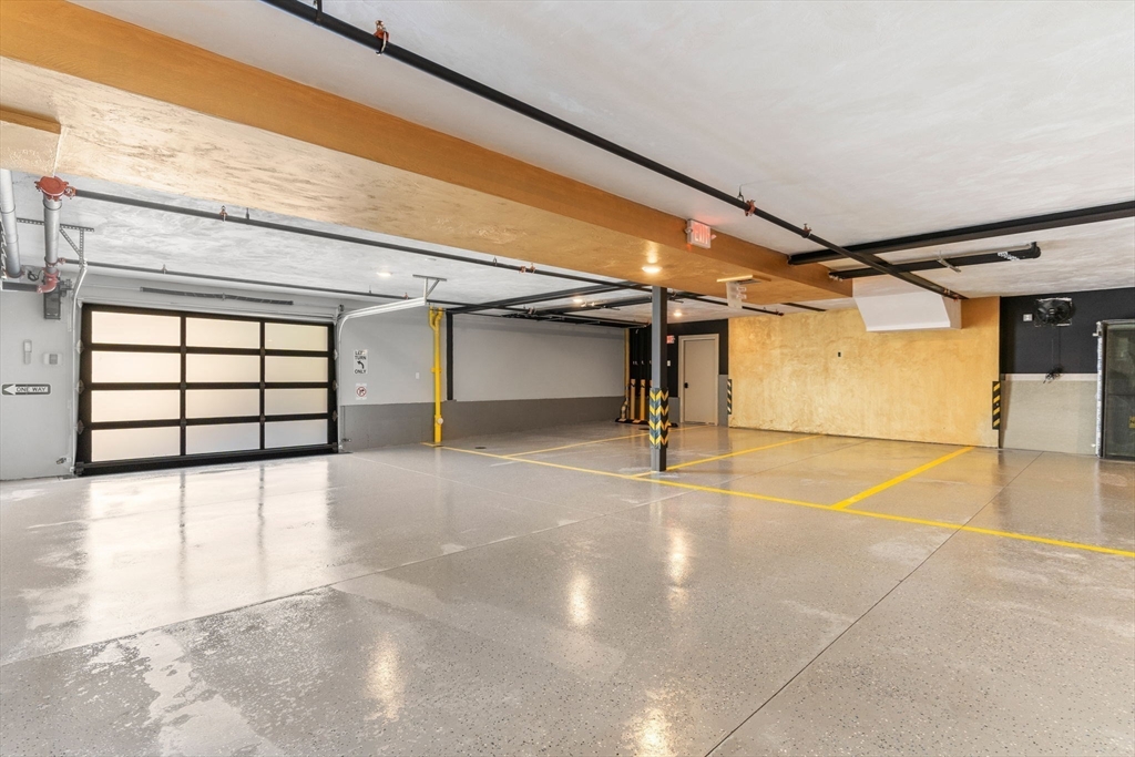 124 Warren Street, Unit 202 Boston, MA 02119 - Photo 20 of 23 a view of a indoor garage