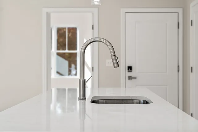 a picture of a bathroom with mirror