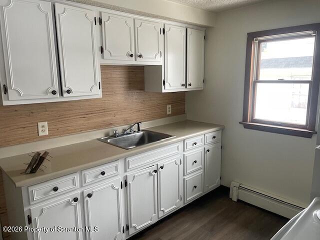414 Depot Street, Unit 2 Scranton, PA 18509 - Photo 2 of 8 a kitchen with white cabinets and a sink