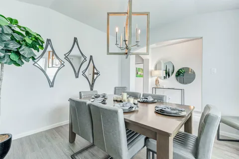 a view of a dining room with furniture