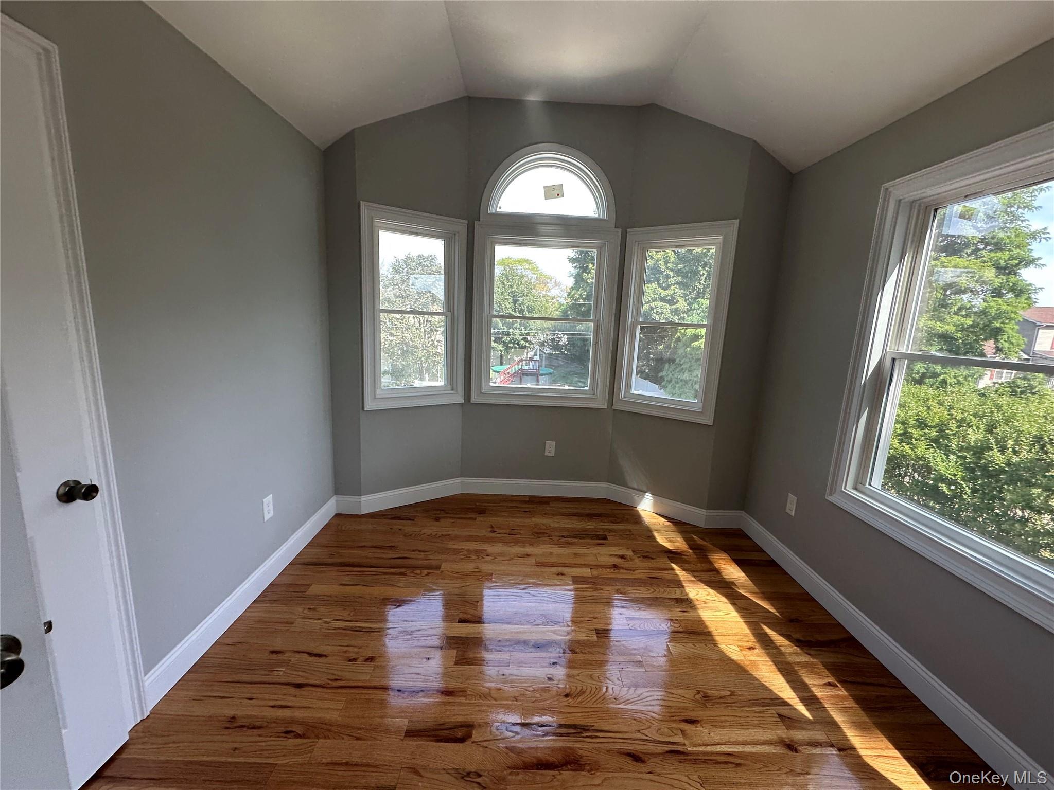 214 Forest Road West Mastic Beach, NY 11951 - Photo 15 of 24 2nd Floor bedroom #2 with high ceilings