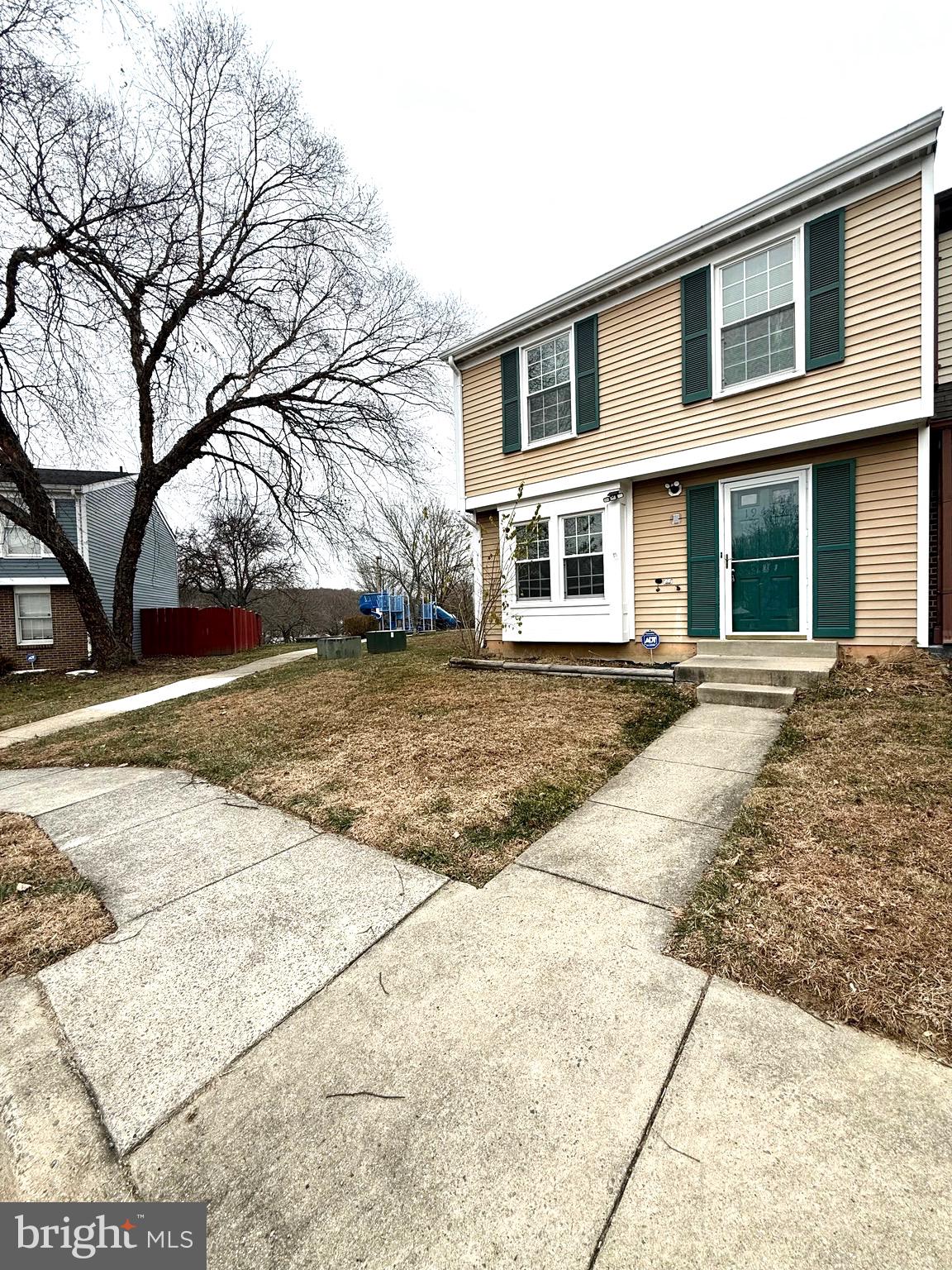 a front view of house with yard