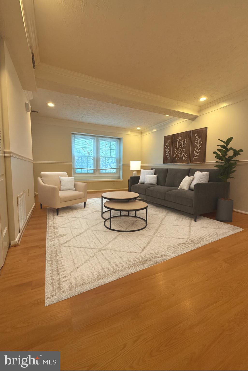 19445 Breezedale Lane Germantown, MD 20876 - Photo 2 of 16 a living room with furniture and a large window