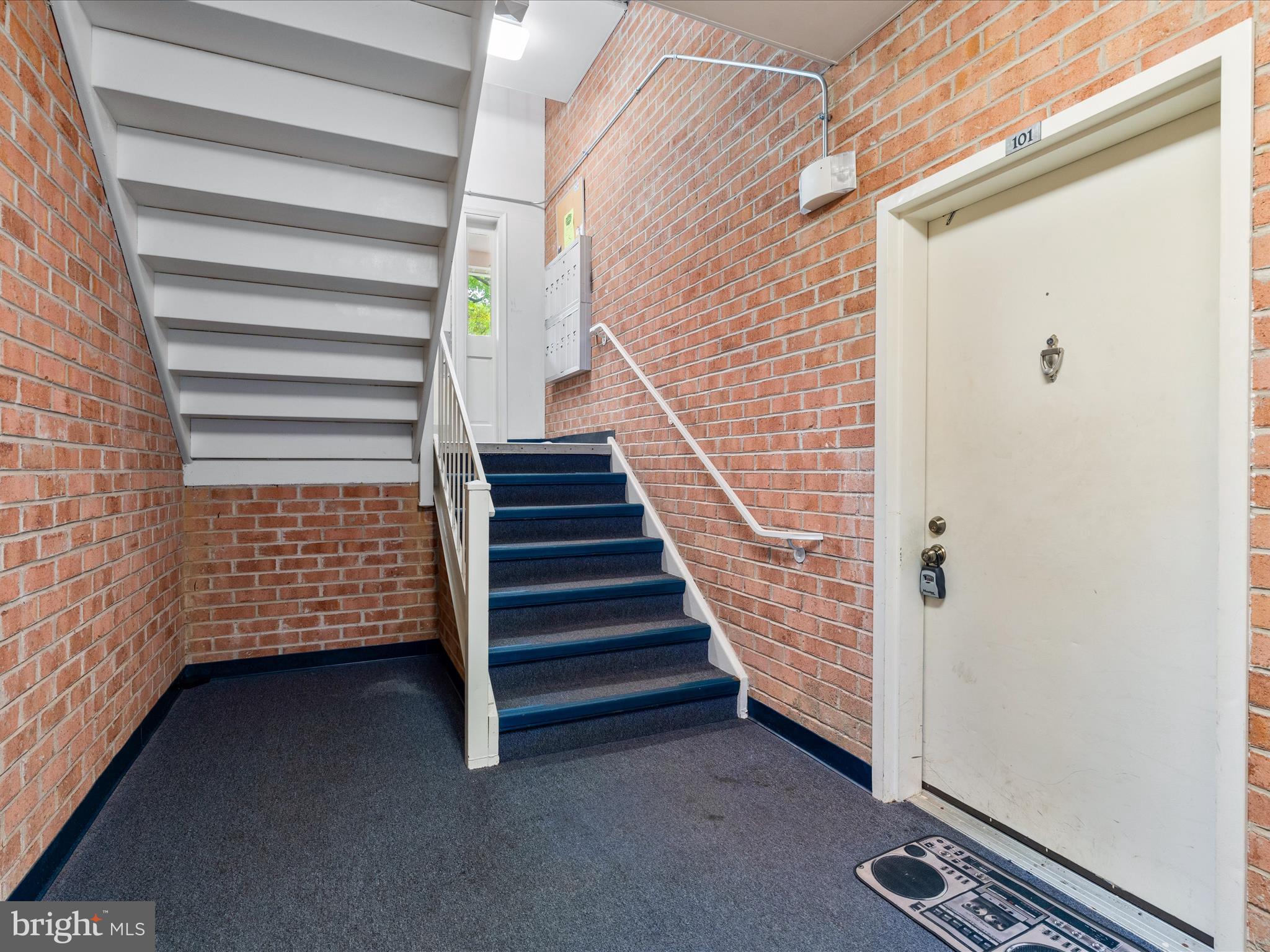 18334 Streamside Drive, Unit 101 Gaithersburg, MD 20879 - Photo 27 of 29 a view of entryway with stairs