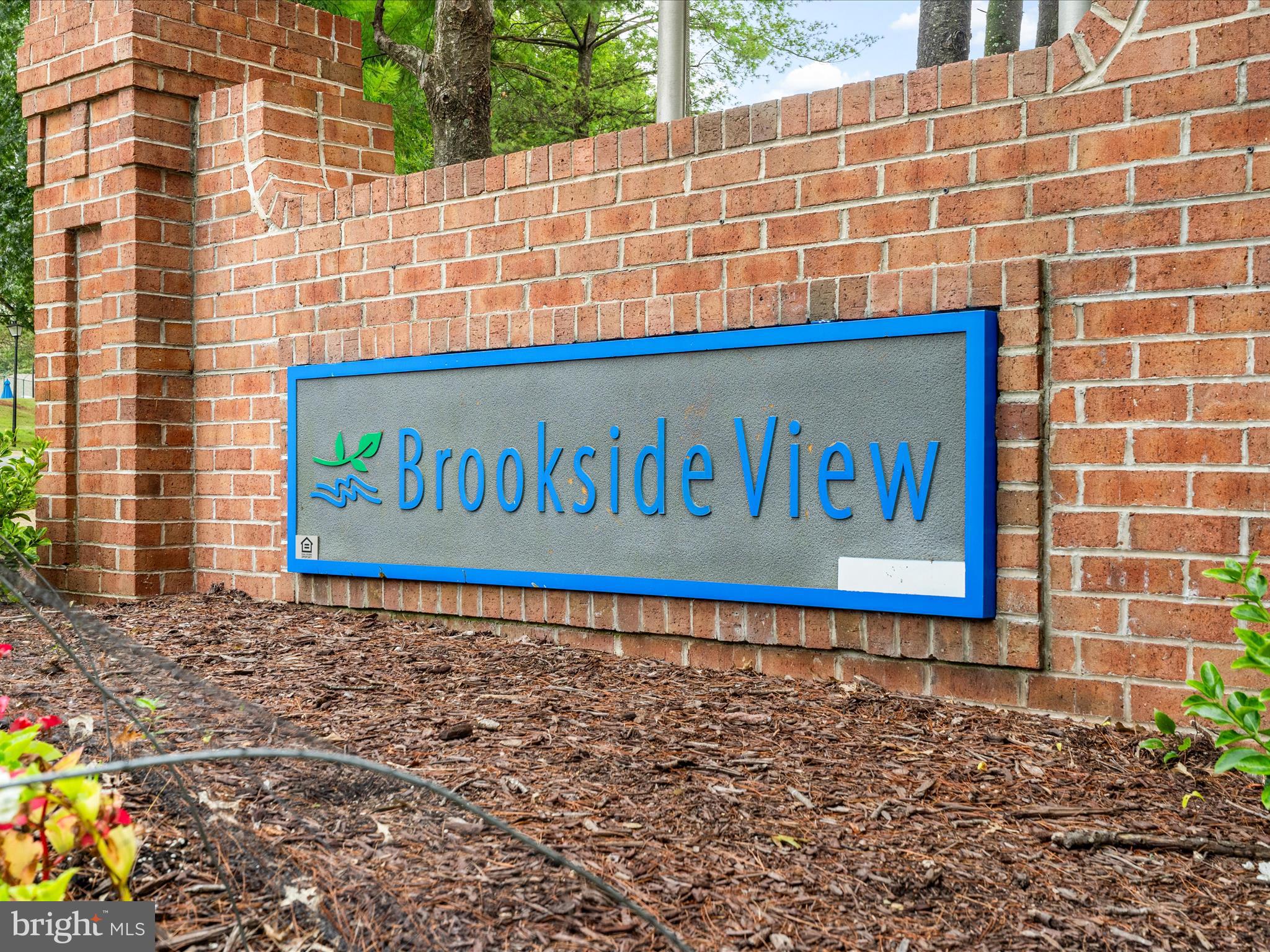 18334 Streamside Drive, Unit 101 Gaithersburg, MD 20879 - Photo 28 of 29 a sign on the wall