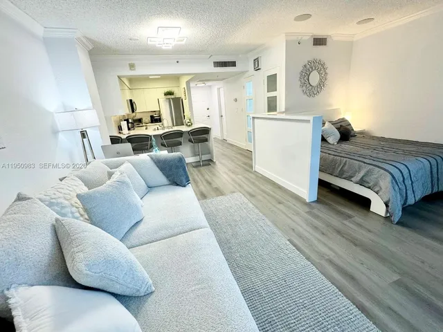 a living room with furniture and a couch